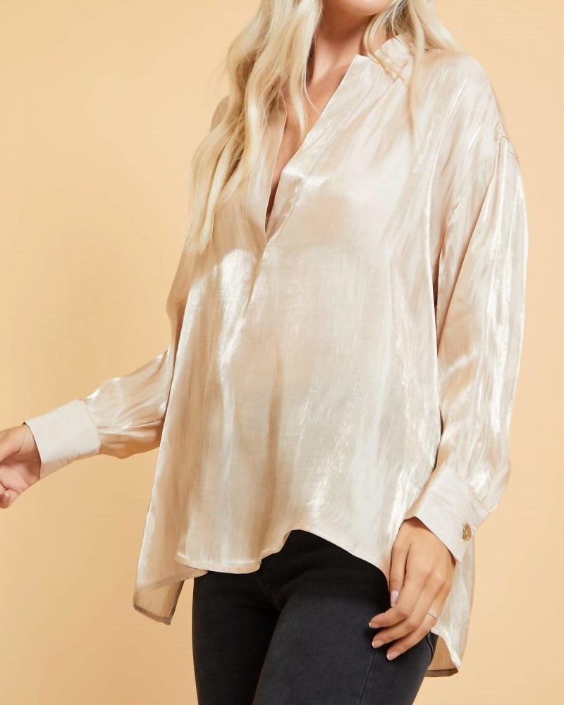 Front of a model wearing a size L Split Neck Shimmer Blouse in Taupe Shimmer in Taupe Shimmer by GLAM. | dia_product_style_image_id:340302